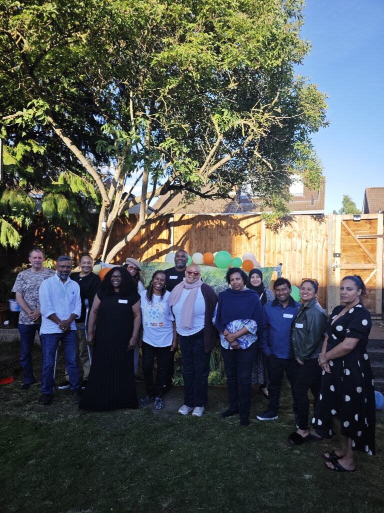 People standing together in a garden