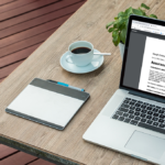 Laptop on desk displaying Ofsted assurance visit letter