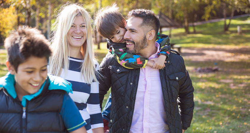 Family walking in park